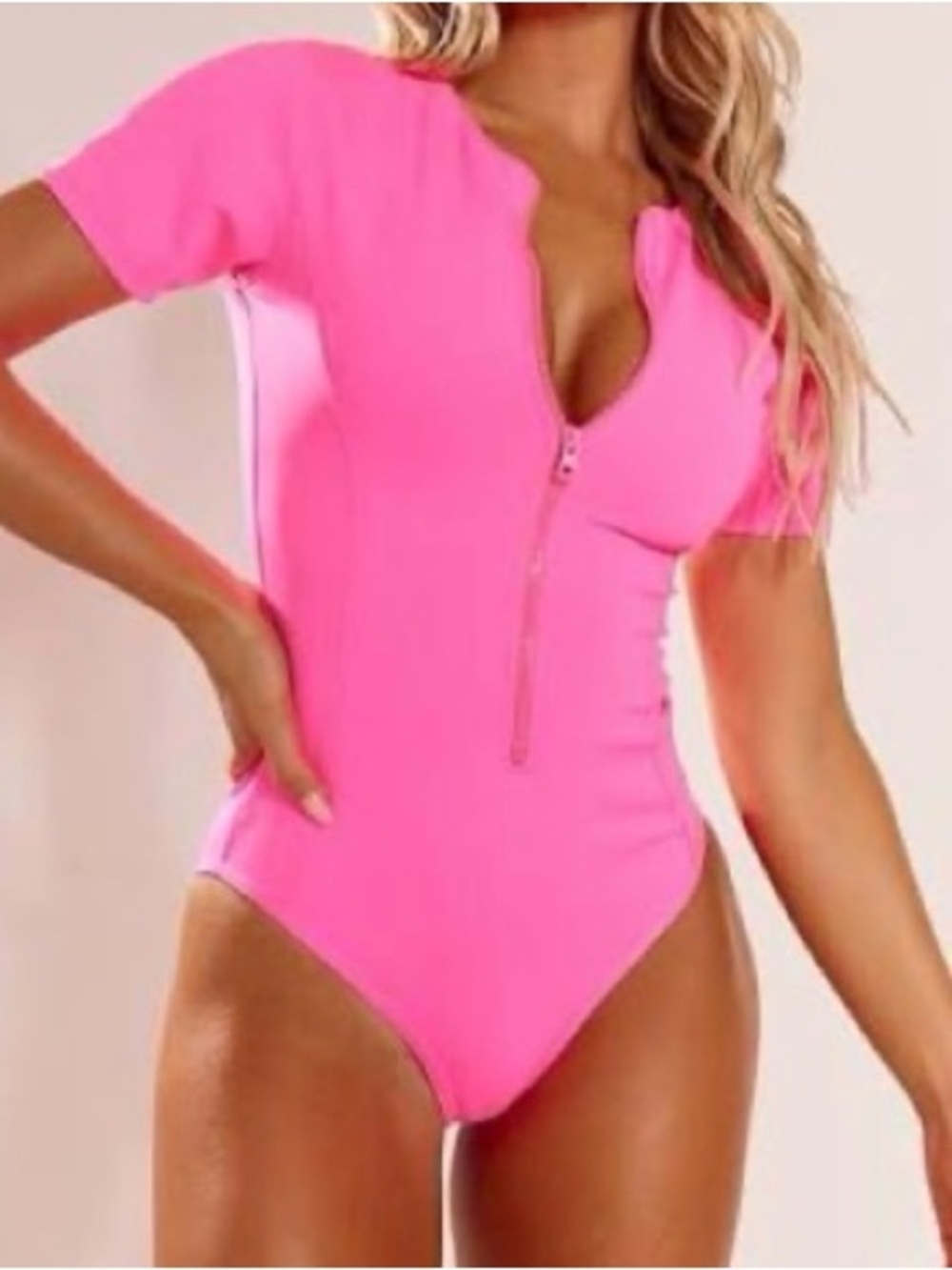 PrettyLittleThing Neon Pink Short Sleeve Zip Front One-Piece Swimsuit